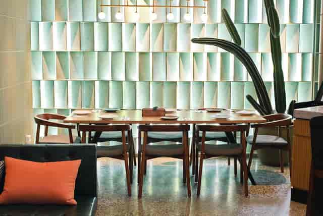 Stylish VIP Room with round table, modern chairs, ideal for meetings and gatherings.