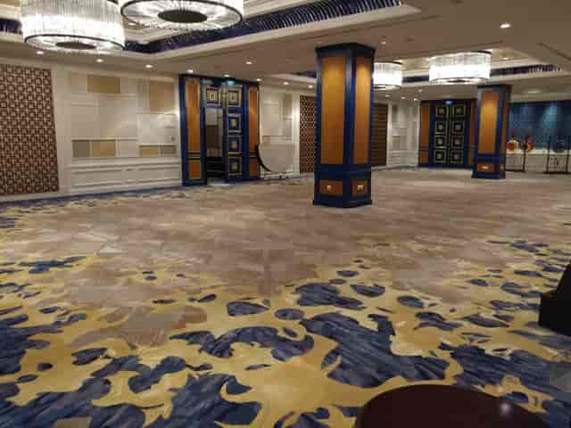 Grand Ballroom at Shangri-La Jakarta, elegant chandelier, event space for banquets and conferences.