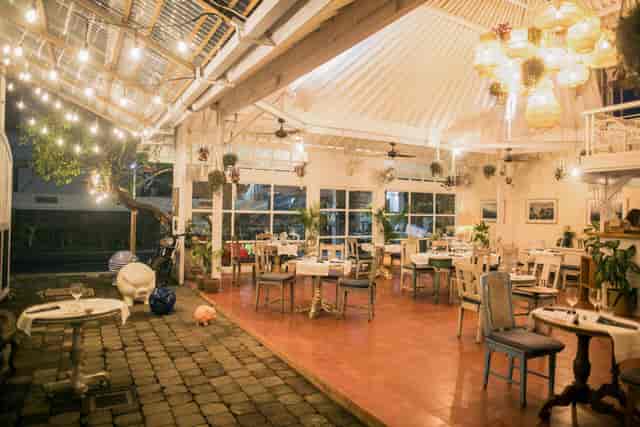 Classic terrace at Zibiru Restaurant with string lights, perfect for events and gatherings.