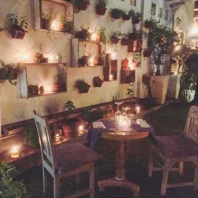Intimate outdoor courtyard at Zibiru Restaurant, ideal for romantic dinners and private events.