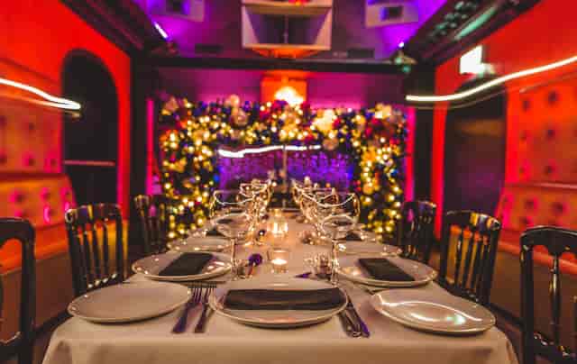 Elegant dining table setup in TOY ROOM for upscale events and intimate gatherings.