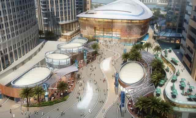 Promenade at Dubai Opera: modern venue ideal for conferences with lush greenery.
