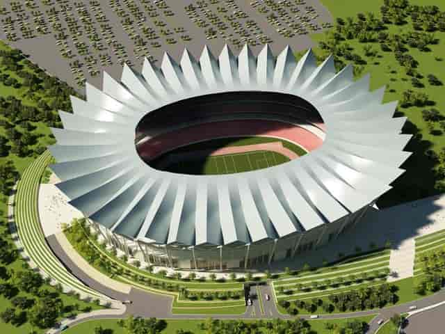Modern outdoor stadium in Dubai Sports City, ideal for sports and concerts.