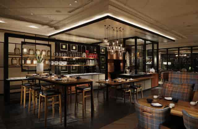 Sophisticated restaurant event space with modern decor for intimate meetings and dinners.