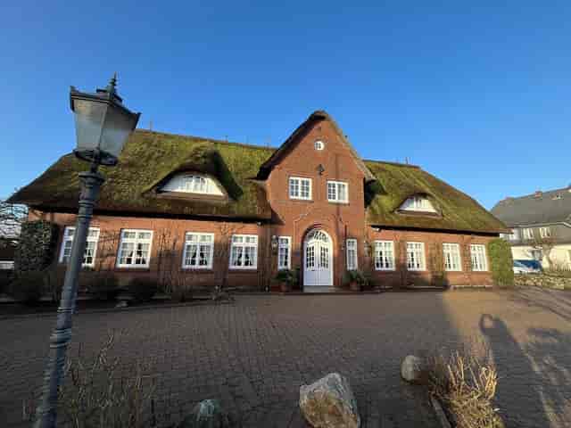Thatched-roof restaurant in Hotel Jörg Müller, perfect for retreats and gatherings.