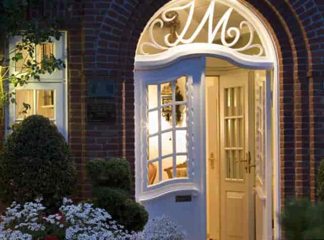Wellness & Spa entrance at Hotel Jörg Müller, elegant ambiance for events and gatherings.