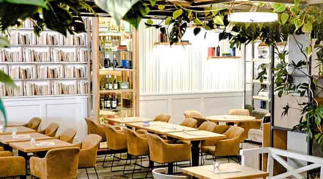 Stylish bar interior with modern decor, ideal for networking and intimate events.