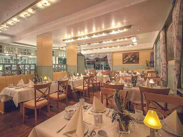 Elegant Restaurant Papillon with sophisticated decor, perfect for corporate events or gatherings.