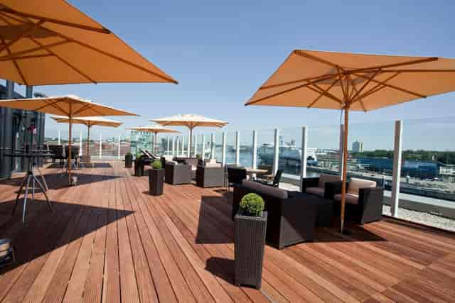 Rooftop terrace at ATLANTIC Hotel Kiel, spacious deck for outdoor events and gatherings