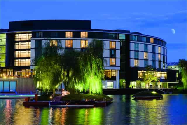 Ritz-Carlton Wolfsburg suites at twilight, perfect for elegant outdoor events.