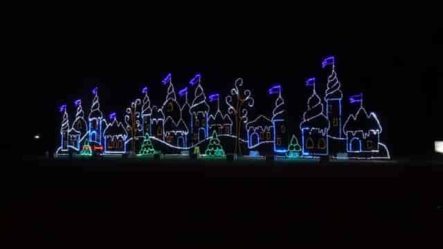 Illuminated whimsical village at The Fairgrounds for winter festivals and holiday parties.