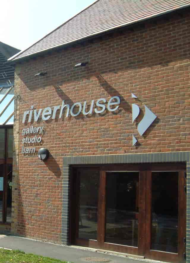 Riverhouse Barn Arts Centre signage for creative gatherings and art exhibits.