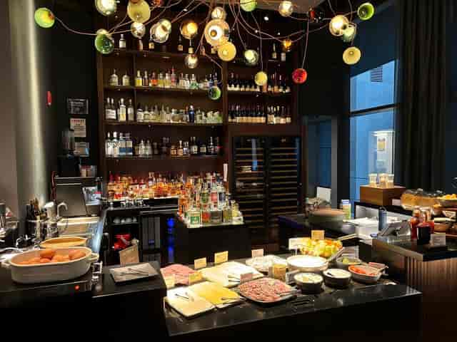 Stylish bar setup at Cloud One Hotel for events, featuring vibrant décor and quality catering.