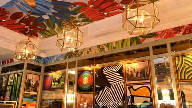 Vibrant Restaurant in The Ivy Dawson Street with artistic ceiling, ideal for networking events.