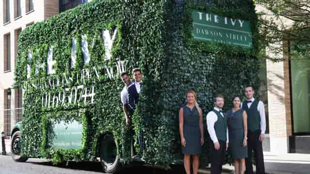 "Upscale restaurant marketing vehicle wrapped in greenery for events at The Ivy Dawson Street."
