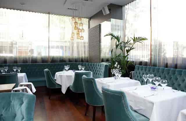 Elegant restaurant in Greenhouse Function Room, perfect for corporate luncheons and events.