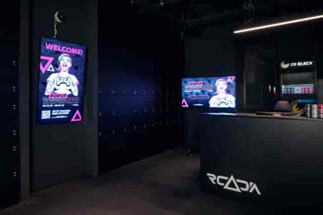Modern Gaming Zone with digital signage, ideal for tech-focused interactive events.