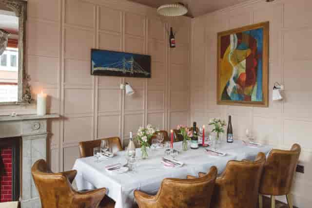 Elegant Pig's Ear private dining room, fireplace, event space