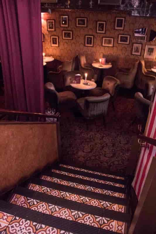 Vintage Cocktail Club lounge, dim lighting, networking event