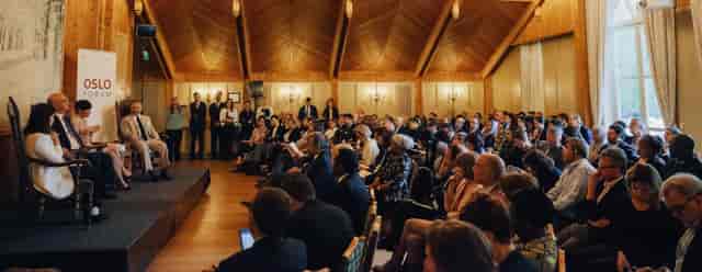 Oslo Congress Centre seating event, wood tones, corporate meeting
