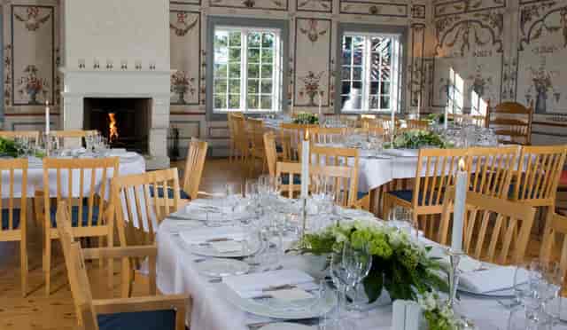 Historic Gjestestuene dining hall, elegant event venue.