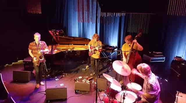 Jazz concert stage, piano, upscale venue, live music