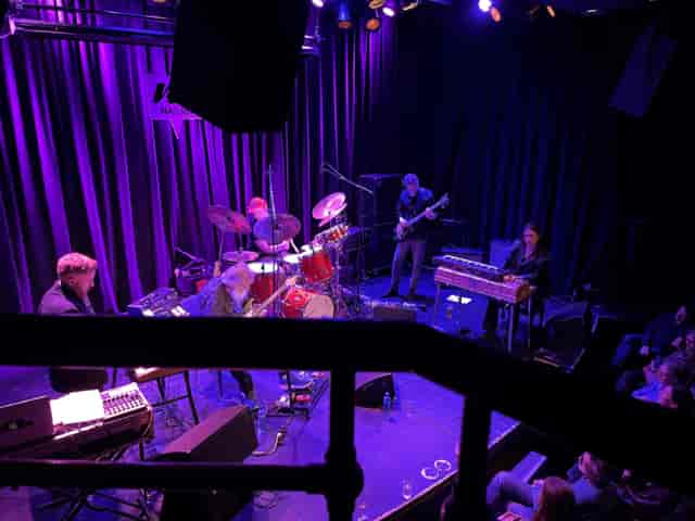 Jazz club stage, intimate music venue, corporate event