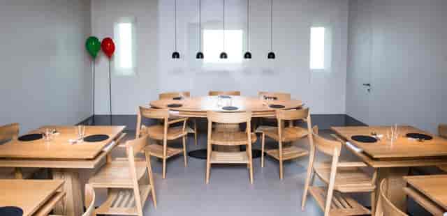 Modern Restaurant D'O, oval table, corporate event, reception
