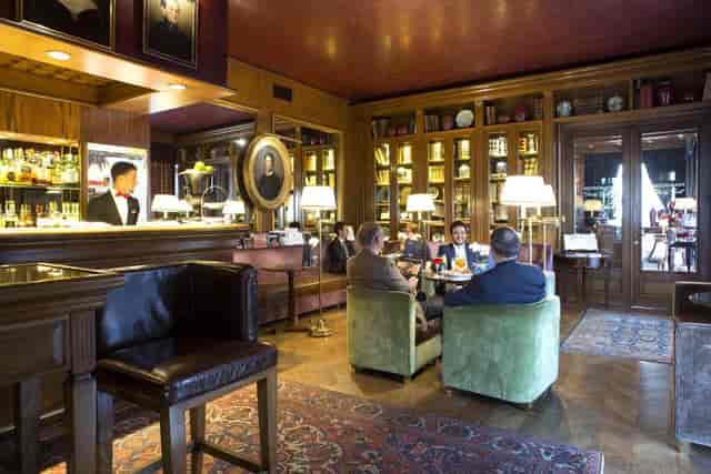 Hotel de la Ville executive lounge, networking event, upscale meeting