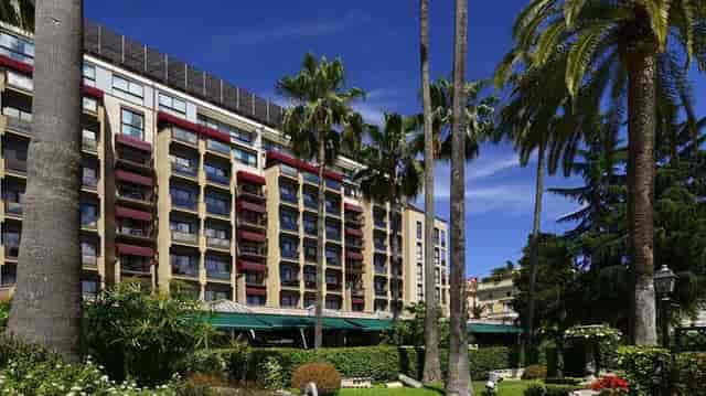 Luxury hotel venue, palm trees, conference, event