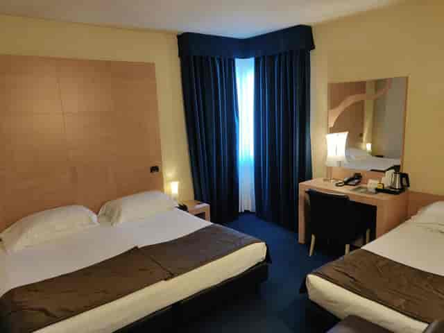 Hotel room desk bed event conference