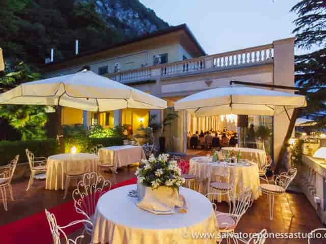 Elegant Villa Giulia terrace event, floral decor, al fresco dining.