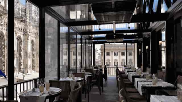 Rooftop restaurant Da Giacomo Arengario, elegant city views, corporate dinner, product launch.