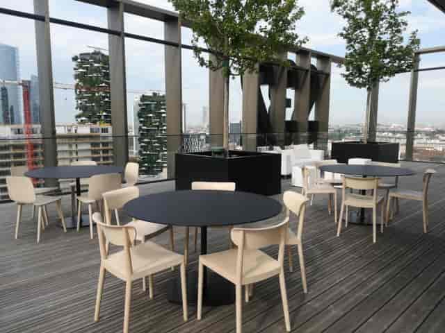 Rooftop terrace bar, urban, cocktail, networking event.