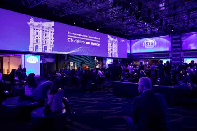 Modern Palazzo Mezzanotte event space, digital display, corporate reception.