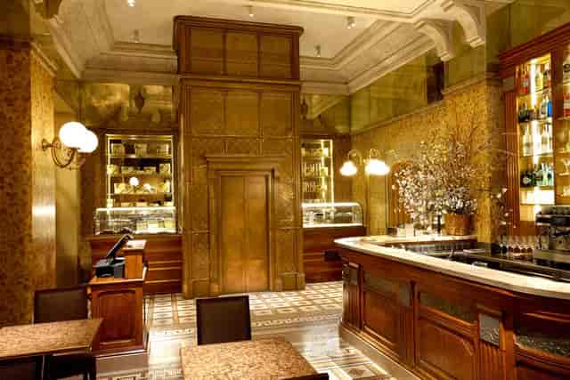 Cracco Ristorante wine cellar: opulent Art Deco, executive event, VIP reception.