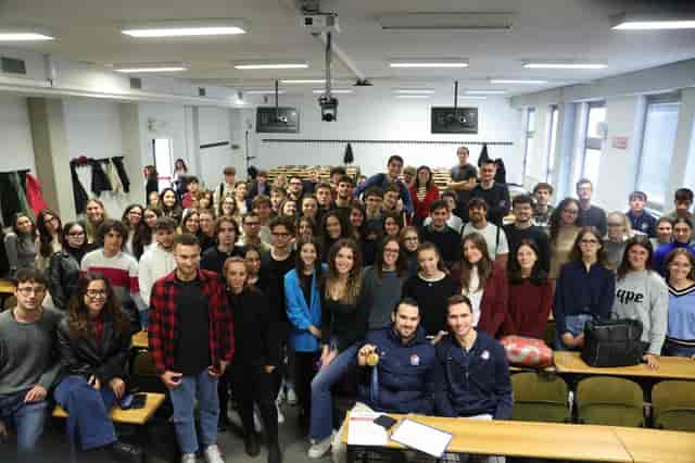 UniCatt lecture hall: students, natural light, workshop, networking
