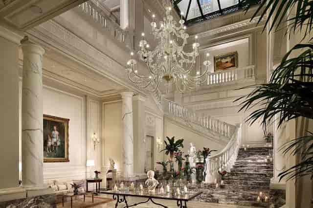 Elegant staircase in Sala della Lettura, Palazzo Parigi Hotel - luxury event venue.