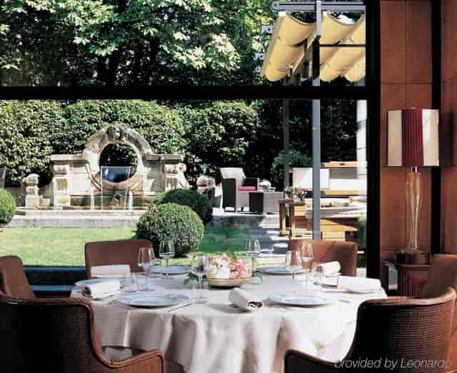 Elegant dining space at Hotel Principe di Savoia, perfect for upscale events and gatherings.