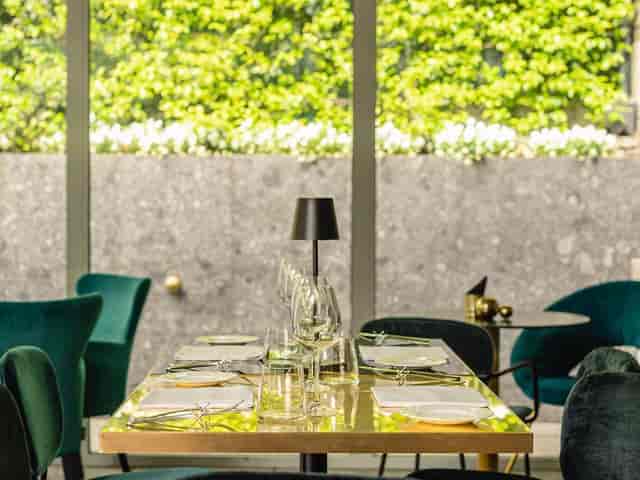 Elegant dining setup in Bianca Maria Palace Hotel gardens for intimate gatherings and corporate events.