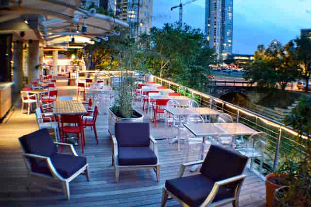 Grove Wine Bar patio events, cocktails, networking.