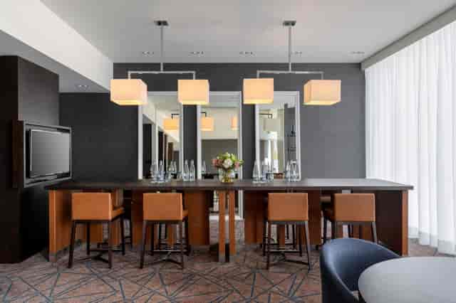 Crowne Plaza executive lounge, board meeting, private dining.
