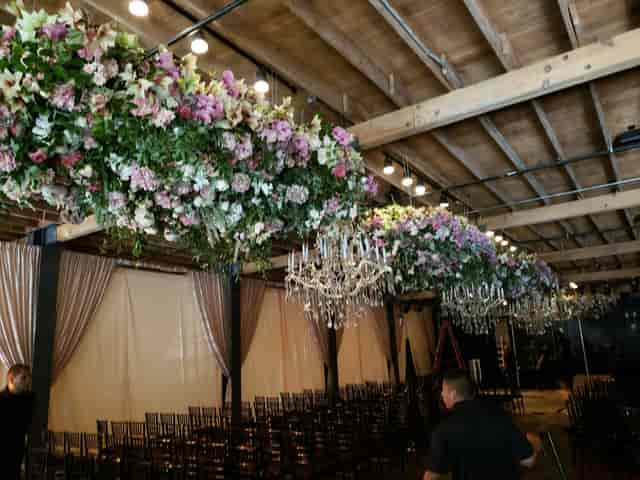 Brazos Hall aerial floral chandeliers event decor