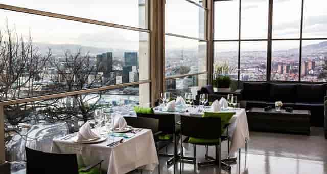 Ekebergrestauranten terrace: panoramic city views, corporate event, executive retreat.