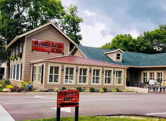 Rustic urban grill event venue with sunroom