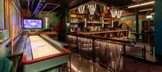 Urban pub games area, shuffleboard, corporate event, networking