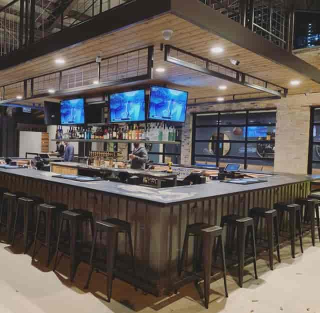 Live music bar, corporate event, networking mixer, industrial venue