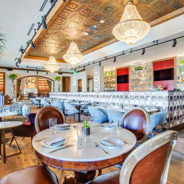 Upscale dining event, marble tables, corporate reception, wedding party.