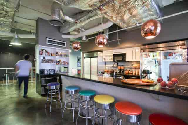 Capital Factory breakout bar, modern industrial networking event.