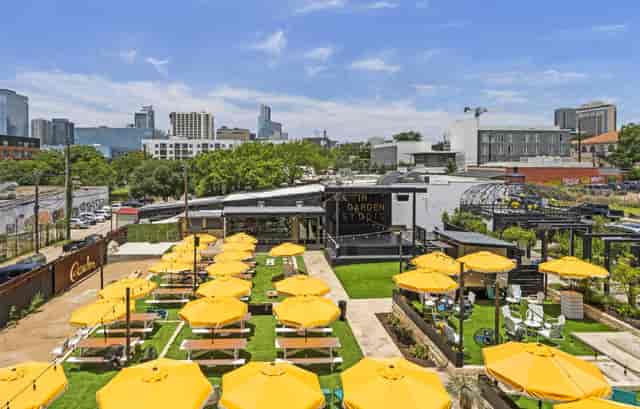 IYKYK Inn Cahoots outdoor event, seating, modern backdrop, corporate, networking
